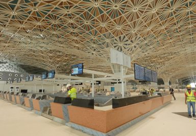 Why is Dhaka airport's third terminal still not operational despite being ready?