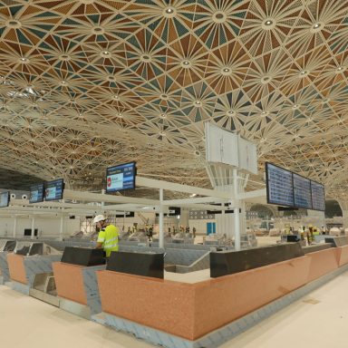 Why is Dhaka airport's third terminal still not operational despite being ready?