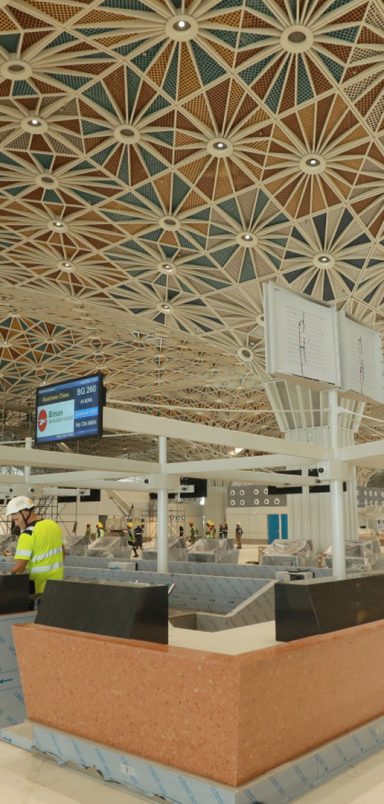 Why is Dhaka airport's third terminal still not operational despite being ready?
