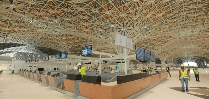 Why is Dhaka airport's third terminal still not operational despite being ready?