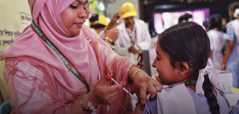 Which age groups should take the typhoid vaccine and how to register