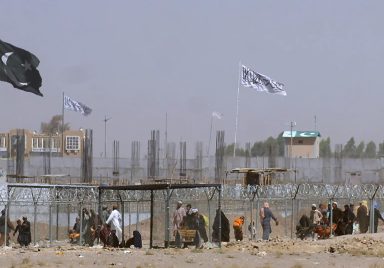 What sparked the heavy gunfire between Pakistan and Afghanistan along their shared border?