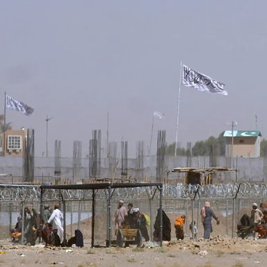 What sparked the heavy gunfire between Pakistan and Afghanistan along their shared border?