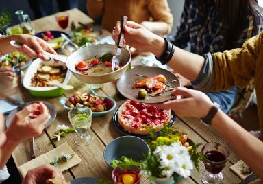 Why do humans enjoy the tradition to feast together?