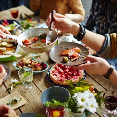 Why do humans enjoy the tradition to feast together?