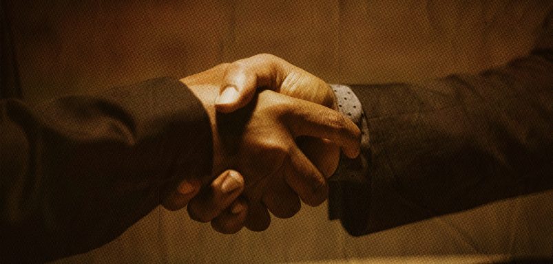 Why do we shake hands and how did the tradition begin?