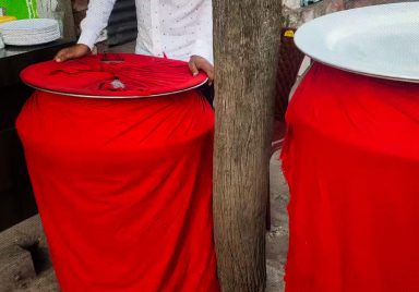 Why do Biryani pots have red cloth wrapped around them?