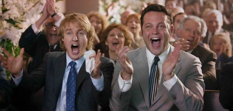 Why do humans clap to show appreciation and celebrate performances?