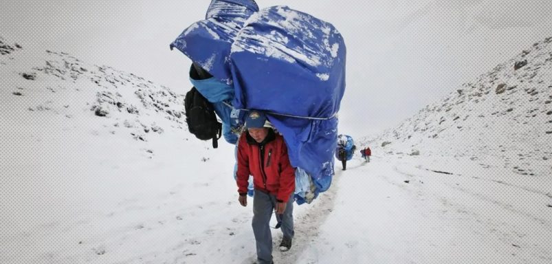 How do humans carry loads heavier than their own bodyweight?