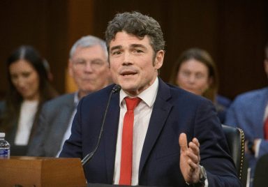 Why did officials resign from the Trump administration?