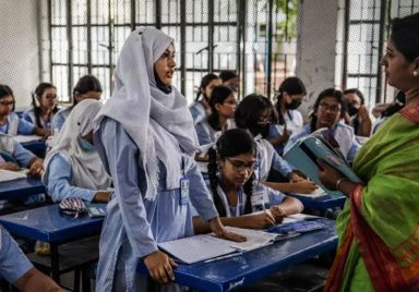 Why is the government hiring retired teachers in private schools in Bangladesh?