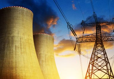 What explains the gap between nuclear weapons and nuclear energy?