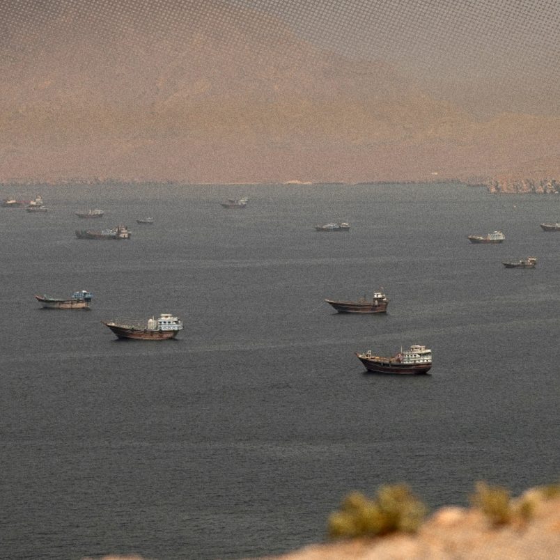 Why is the IMO helping evacuate 11,000 stranded sailors from the Strait of Hormuz?
