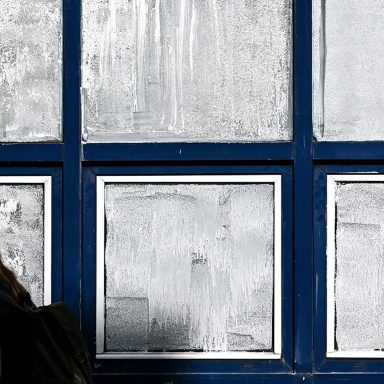 Why are the French painting their windows with chalk?