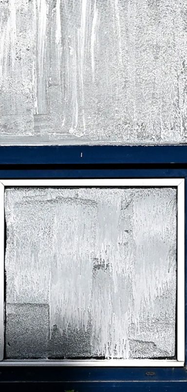 Why are the French painting their windows with chalk?