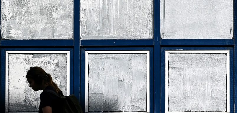 Why are the French painting their windows with chalk?