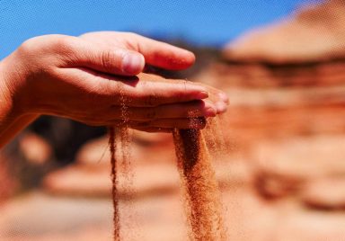 Why does Saudi Arabia import sand despite being a desert country?