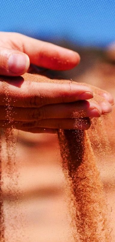 Why does Saudi Arabia import sand despite being a desert country?