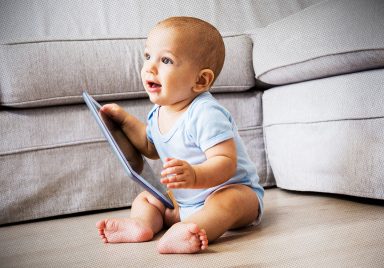 Why should babies avoid screens before age 2?