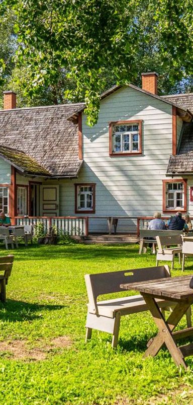 Why do Estonians invite strangers into their back gardens each summer?
