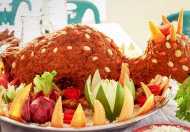 What's behind the tradition of the whole goat at weddings?