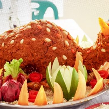 What's behind the tradition of the whole goat at weddings?