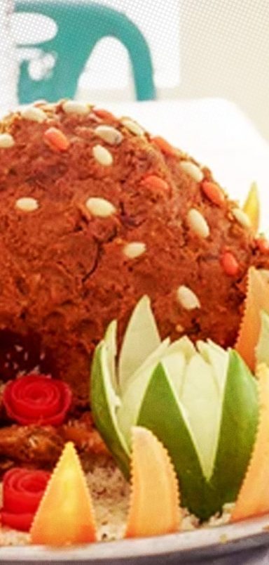 What's behind the tradition of the whole goat at weddings?