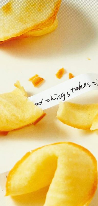 What is the history behind fortune cookies and how are they made?