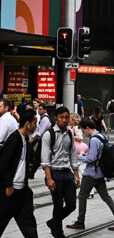 Why is Australia barring students from bringing partners and children?