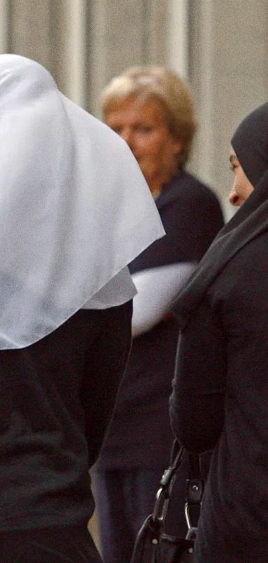 Why is Italy planning limits on foreign students and a burqa-hijab ban in schools?