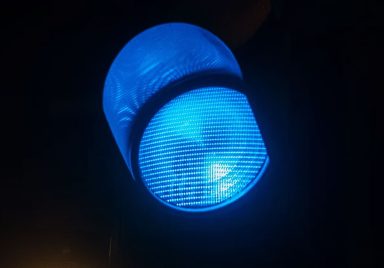 Why do some traffic lights have blue lights?