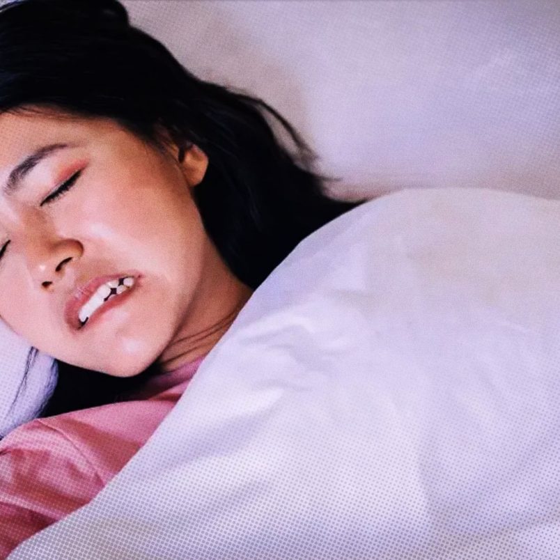 Why do people grind their teeth in their sleep?